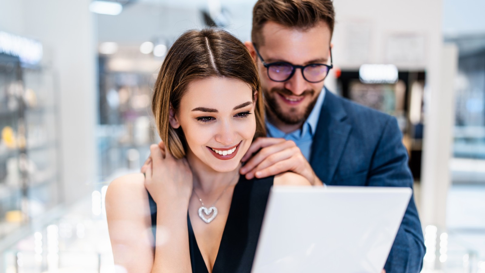 A man and a woman in a jewelry shop